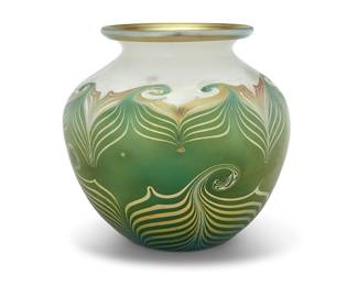 241 A Quezal pulled feather iridescent glass vase Early 20th century Marked to underside: Quezal / 12 Height 7 1/4 in., diameter 7 7/8 in. Estimate: $1,200 - $1,800