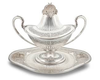 2 A Portuguese sterling silver covered tureen on stand 20th century With maker’s mark and: [Eagle 916] Height of tureen 15 1/2 in., width 18 in., depth 22 in.; platter length 22 in., width 13 in. Total weight 170.9 oz. troy approximately   $2,000-4,000