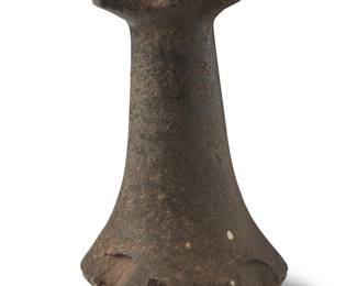 186 A Tahitian stone penu pounder Likely Maupiti Island, Tahiti Height 6 1/2 in., diameter 3 3/4 in. Estimate: $800 - $1,200