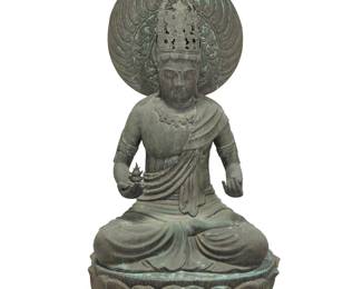 204 A monumental Japanese bronze Bodhisattva Meiji era (1868-1912) or later Depicted on a lotus base with flaming prabhamandala Height 76 in., width 40 in., depth 36 1/2 in. Estimate: $8,000 - $12,000