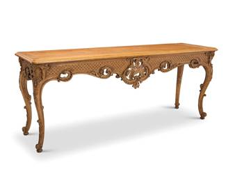154 A Louis XV style carved hardwood console table 20th century With openwork apron raised on cabriole legs ending in scroll feet Height 34 1/2 in., width 84 in., depth 24 in. Estimate: $700 - $900