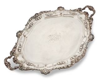 17 A Gorham sterling silver serving tray Circa 1888-1894 Marked for Gorham and sterling and numbered: A1617; monogrammed Height 3 3/4 in., width 33 in., depth 22 in. Weight approximately 186.3 oz. troy approximately Estimate: $9,000 - $12,000