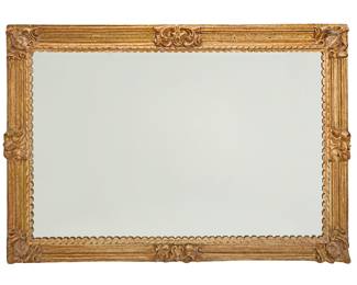 360 A large Baroque style giltwood mirror 20th century Carved with foliate accents and intricate trimming Height 83 in., width 55 in., depth 4 1/4 in. Estimate: $1,000 - $1,500