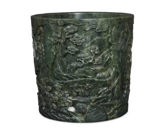 143 A Chinese spinach jade brush pot Circa 1920-1940 Carved in low to medium relief with figures, buildings, and prunus trees Height 7 in., diameter 7 3/8 in. Estimate: $8,000 - $12,000
