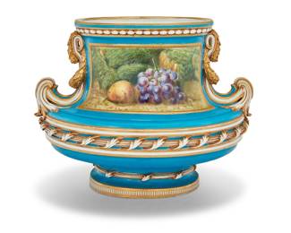 322 A Mintons porcelain bleu céleste ground 'Queen's Vase' Third quarter 19th century In the Sèvres-style, with fruit reserves on the gilt highlighted bleu céleste ground Puce printed factory mark, impressed MINTONS Height 9 3/4 in., width 12 in., depth 9 in. Estimate: $600 - $800