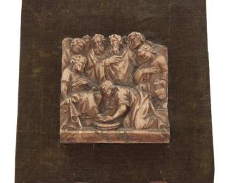 97 A Flemish alabaster mezzo relief of Christ washing the feet of the disciples Likely Maline, 16th/17th century Affixed to a felt-lined backing set on a wood stand Height of panel 5 in., width 4 7/8 in., depth 3/4 in.; backing 10 1/8 x 8 5/8 in.; height of stand 7 3/8 in. Estimate: $400 - $600