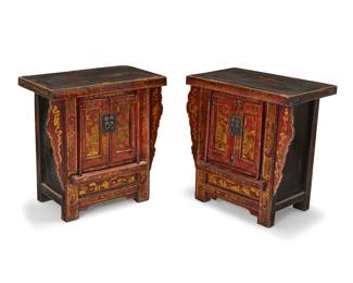 72 A pair of Chinese lacquered softwood cabinets 19th century or later Gilt-painted with figural scenes and foliate filigree, each with hinged doors mounted with later iron pulls, opening to reveal a single shelf 2 pieces Height of each 27 in., width 26 in., depth 16 1/4 in. Estimate: $500 - $800