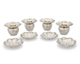 23 A group of Reed & Barton sterling silver 'Francis I' urns and dishes Mid-20th century Designed 1906 Comprising four toothpick urns and four nut dishes Each marked for maker, sterling, pattern, and model number 'X57' or 'X569' 8 pieces Height of each vase 2 3/8 in.; diameter of each 3 1/2 in. Total weight 17 oz. troy approximately Estimate: $500 - $800