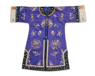 50 A Chinese embroidered blue silk robe fragment 19th century or later The deconstructed blue silk robe featuring multicolored silk floss embroidery in floral and insect motifs, with multiple embroidered and brocade ribbon bands at sleeves and hem, with open, unfinished seams at side and sleeves, unlined, and with corded fabric fastening loops to front Possible stamped signature to right inside collar Center back height 49 in., width 25 1/2 in. (at underarms); Sleeve length cuff to collar 27 1/2 in. approximately Estimate: $1,000 - $1,500