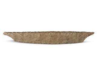 191 A long Hawaiian stone saw/blade Hawaiian Islands Length 16 1/2 in., width 2 5/8 in. Estimate: $1,000 - $1,500