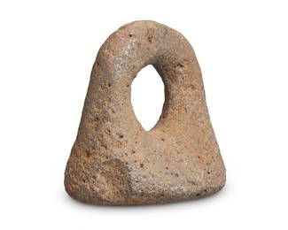 187 A Hawaiian stone ring pounder Kauai Island, Hawaiian Islands Pohaku puk ku'i poi Height 5 1/2 in., width 5 1/8 in., depth 3 1/4 in. Estimate: $1,000 - $1,500