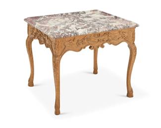 155 A Louis XV style carved walnut occasional table 20th century With dished breche violette marble top Height 27 1/4 in., width 29 1/2 in., depth 26 1/2 in. Estimate: $600 - $800