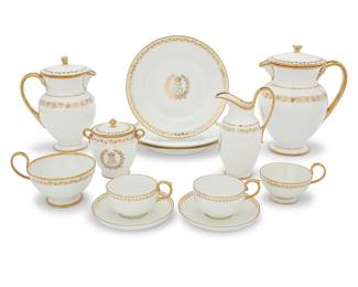 174 A Sèvres porcelain 'Service des Princes' part coffee service Primarily Louis-Philippe 1840s, some 1870s Comprising: 1 larger coffee pot (height 9 7/8 in., width 8 1/8 in., depth 6 1/4 in.) 1 smaller coffee pot (height of larger 8 7/8 in., width 6 7/8 in., depth 5 1/8 in.) 1 covered sugar bowl (4 7/8 in., width 5 in., depth 3 7/8 in.) 1 creamer (height 7 1/2 in.) 7 cups of various sizes (widest 4 7/8 in.) 2 saucers (5 5/8 in.) 3 plates (9 1/2 in.) Each with blue and green factory marks, and red inventory marks 16 pieces Estimate: $800 - $1,200