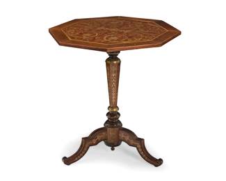 119 A Regency style brass inlaid octagonal tilt-top table Late 19th century With brass mounts, the inlay depicting foliate motifs and butterflies, raised on a tripod base with shaped legs ending in scrolled terminals Height 27 3/4 in., width 26 3/4 in., depth 24 3/4 in. Estimate: $800 - $1,200