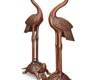 208 A pair of Japanese bronze crane and turtle figural groups 20th century 2 pieces Height of each 25 in., width 9 1/4 in., depth 5 3/4 in. Estimate: $700 - $900