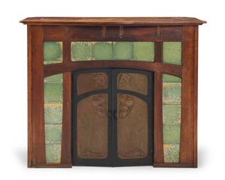 252 An Arts & Crafts oak, copper, and tile fireplace Circa 1900 With iron framed repoussé copper summer cover doors centered by green glazed ceramic tiles set in a wood frame Tiles marked verso: BOCH FRERES / LA LOUVIERE Height 43 1/4 in., width 52 in., depth 20 1/2 in. Estimate: $500 - $800