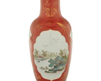 113 A Chinese iron red enameled porcelain vessel Circa 1950s Bearing painted Jingdezhen zhi mark to underside Height 12 1/8 in., diameter 5 in. Estimate: $1,000 - $1,500