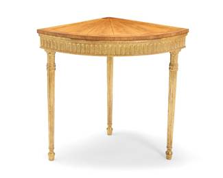 161 A Neoclassical style parcel gilt corner console table 20th century With inlaid satinwood veneer top above giltwood apron and columnar supports Height 35 1/4 in., width 37 3/4 in., depth from corner 26 3/4 in. Estimate: $500 - $700
