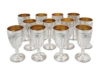 27 A set of twelve Towle sterling silver 'Louis XIV' goblets Mid/late 20th century Designed 1924 With gold-washed interior Each marked for maker, pattern, sterling, and numbered: 68160 12 pieces Height of each 6 5/8 in., diameter 3 in. Total weight 66.2 oz. troy approximately Estimate: $2,000 - $3,000