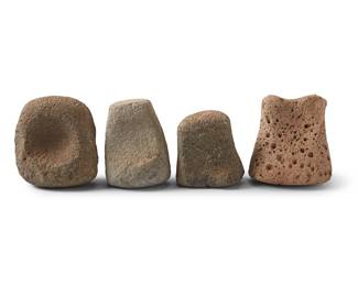 199 Four Hawaiian stone pestles/pounders Hawaiian Islands 4 pieces Heights 3 3/8-5 1/8 in. Estimate: $1,200 - $1,800