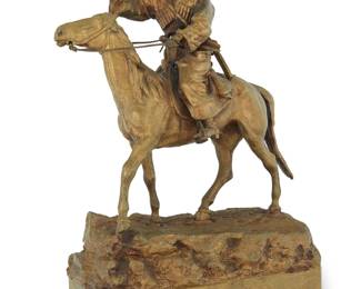 346 A Russian gilt bronze of a Cossack on horseback After a model by Vasily Grachev (1830-1905), 20th century Signed in Cyrillic: [LBP Grachev / Fabr. C.F. Woerrfel St. Petersbourg] Height 9 in., width 6 3/4 in., depth 3 1/8 in. Estimate: $600 - $800