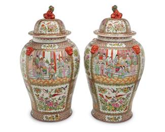 376 A pair of large Chinese Famille Rose porcelain covered urns Late 20th century Each unmarked 2 pieces Height of each 31 in., diameter 16 1/2 in. Estimate: $700 - $900