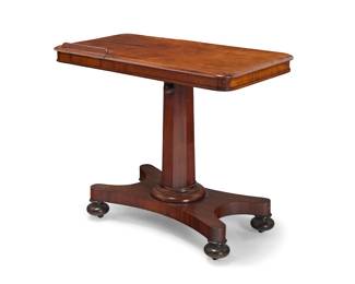 306 A William IV mahogany invalid's reading table Early 19th century With two opposed pop-up easel-back reading surfaces, the top with sliding action, raised on a pedestal base with bun feet Height 28 in., width 36 in., depth 18 in. Estimate: $700 - $900
