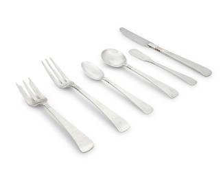 22 A Porter Blanchard sterling silver 'Capri' flatware service for four Mid-20th century Designed 1930 Comprising: 4 dinner knives (9 1/4 in.) 4 butter spreaders (6 in.) 4 dinner forks (8 in.) 4 salad forks (6 3/4 in.) 4 cream soup spoons (6 3/8 in.) 4 teaspoons (6 1/4 in.) Each with factory marks for sterling 24 pieces Total weight 27.9 oz. troy approximately Estimate: $1,000 - $1,500