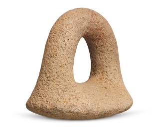 183 A Hawaiian stone ring pounder Kauai Island, Hawaiian Islands Pohaku puk ku'i poi Height 6 1/4 in., width 7 in., depth 4 3/8 in. Estimate: $1,000 - $1,500