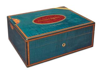 387 An Elie Bleu 'Flor de Tabacos' cigar humidor and cigar cutter Early 21st century Marked to lock: ELIE BLEU PARIS Height 4 3/4 in., width 12 in., depth 9 3/4 in. Estimate: $800 - $1,200