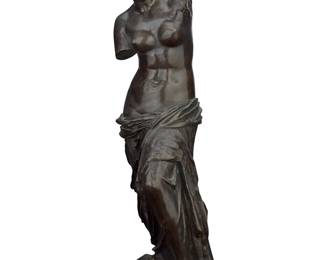 149 A French patinated bronze figure of Venus de Milo Late19th/early 20th century After the antique Impressed 'AD', possibly for Auguste Delafontaine. Height 22 1/2 in., width 6 7/8 in., depth 6 3/4 in. Estimate: $400 - $600
