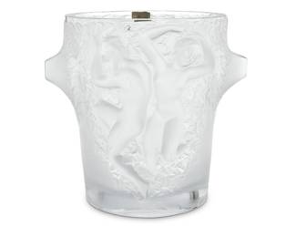 378 A Lalique frosted glass 'Ganymede' wine cooler Late 20th century Designed 1955 by Marc Lalique (1900-1977) Etched: Lalique ® France; interior rim with applied factory label Height 9 1/8 in., width 10 in., depth 9 3/8 in. Estimate: $800 - $1,200
