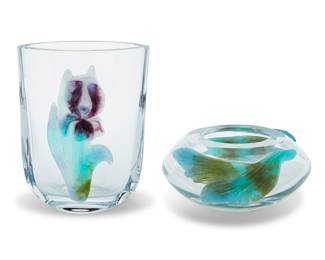 382 Two Daum pâte de verre and clear glass table vessels Late 20th/early 21st century Comprising a vase depicting an Iris and a bowl depicting two foliate elements Each etched: Daum France 2 pieces Height of vase 9 in., width 7 in., depth 5 in.; height of bowl 3 1/2 in., width 8 5/8 in., depth 8 1/8 in. Estimate: $600 - $800