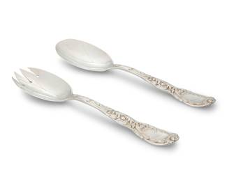 29 A Tiffany & Co. sterling silver 'Chrysanthemum' salad serving set Early 20th century Each marked for Tiffany and for sterling 2 pieces Length of each 8 3/4 in. Total weight 7 oz. troy approximately Estimate: $400 - $600