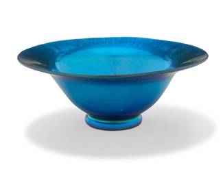 242 A Steuben blue Aurene glass footed bowl 1920s Etched to underside: aurene / [indecipherable date] Height 2 5/8 in., diameter 6 5/8 in. Estimate: $300 - $400