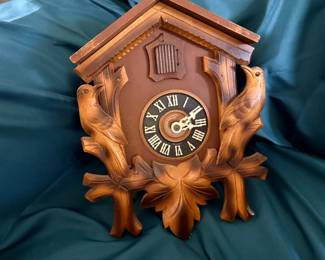 Cuckoo clock with finial and weights (condition unknown)