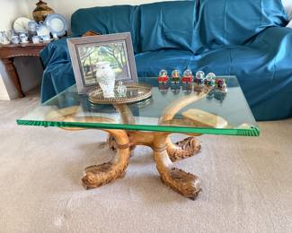 Venetian dolphin carved wood base glass coffee table
