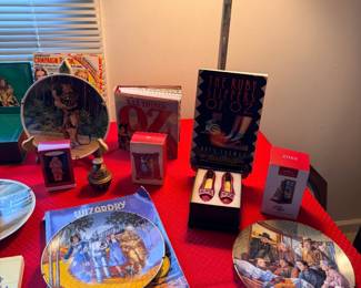 Knowles and Hamilton Collection Wizard of Oz plates, Hallmark Keepsake Oz ornaments, and Oz memorabilia