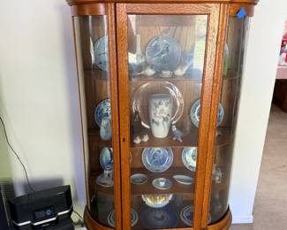 Antique oak bow front china cabinet