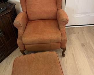 Two upholstered chairs and ottoman
