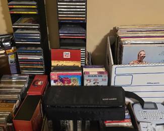 CDs, audiocassettes, DVDs, vinyl records and VHS are located in the office.  When you enter the house, turn right and pass through the kitchen into the hall area.  Office is the doorway  straight ahead.