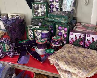 The Purple Christmas Tree Collection to fully decorate a tree! We even have a purple Santa tree topper!
