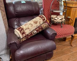 Leather recliner, rugs, chair