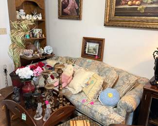Coffee table, sofa, artwork, pillows