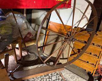 This item is an antique "Great Wheel" spinning wheel
