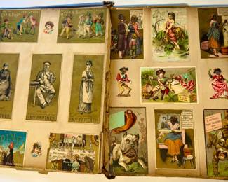 Victorian scrap scrapbook containing a collection of colorful 19th-century trade cards, postcards. Most are Albany, NY and the Capital Region