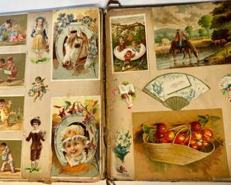 Victorian scrap scrapbook containing a collection of colorful 19th-century trade cards, postcards. Most are Albany, NY and the Capital Region