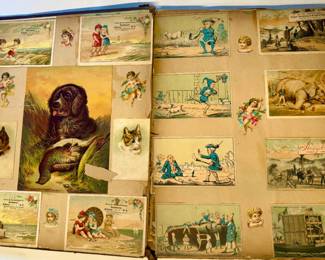 Victorian scrap scrapbook containing a collection of colorful 19th-century trade cards, postcards. Most are Albany, NY and the Capital Region