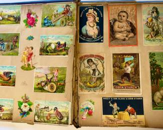 Victorian scrap scrapbook containing a collection of colorful 19th-century trade cards, postcards. Most are Albany, NY and the Capital Region
