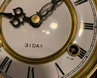 #016	31 Day Regulator Clock w/key in Wooden Case - 12x6x36	 $100.00 